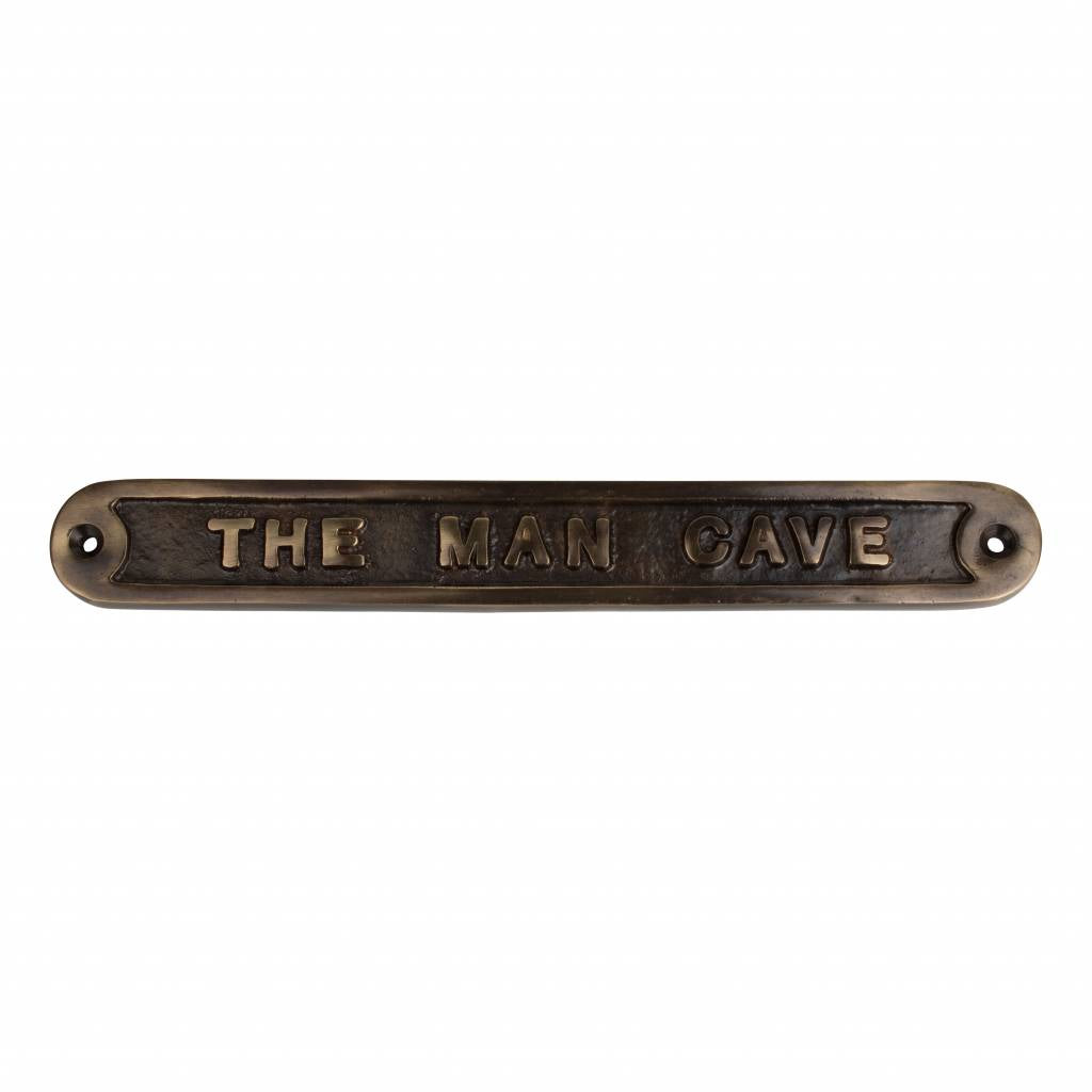 Textschild „The Man Cave“ 215 x 55 mm – robuste Oberfläche aus antikem oder poliertem Messing