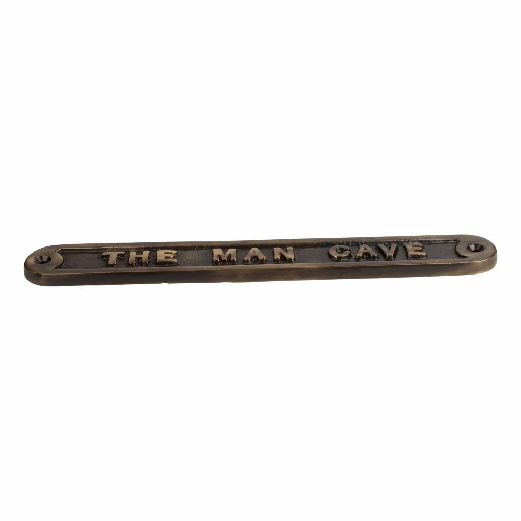 Textschild „The Man Cave“ 215 x 55 mm – robuste Oberfläche aus antikem oder poliertem Messing